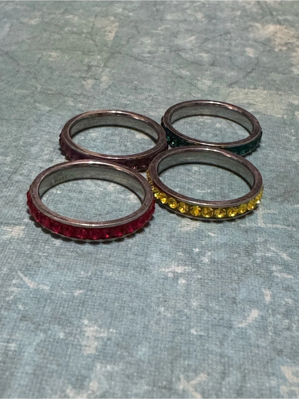 SET OF FOUR STACKABLE STAINLESS STEEL RINGS